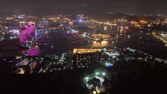 高视角航拍海南三亚游艇旅游与港城市夜景