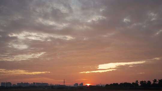 日出时分的田野景观延时