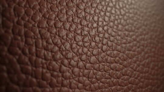 豪华皮革动物皮料手工制作的棕色柔软图案表视频素材模板下载