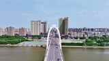 中国吉林梅河口辉发河梅河大桥城市航拍高清在线视频素材下载