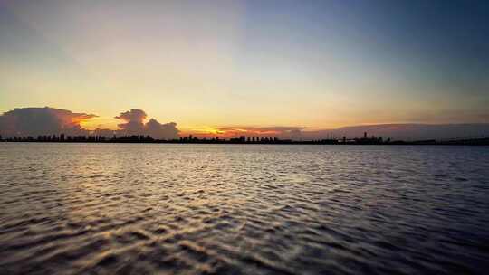 航拍苏州阳澄湖夕阳落日灯塔水面空景