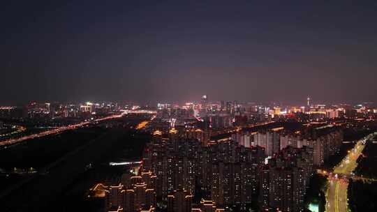 夜间轨道交通高铁经过城市夜景高架车流2