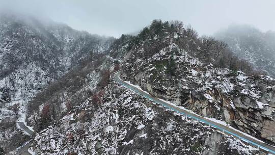 冬天雪后大山公路交通航拍