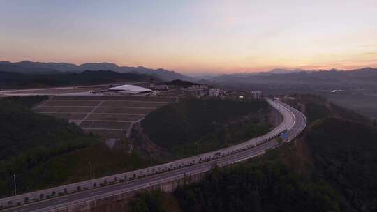 夕阳下建设中丽水机场航拍