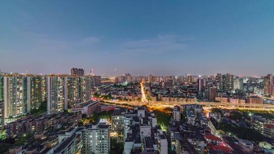 广州城市建筑群与夜晚道路车流灯光延时