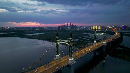 4K哈尔滨阳明滩大桥夜景航拍视频素材模板下载