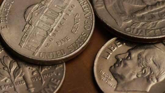 美国货币硬币的旋转库存镜头-MONEY 0291