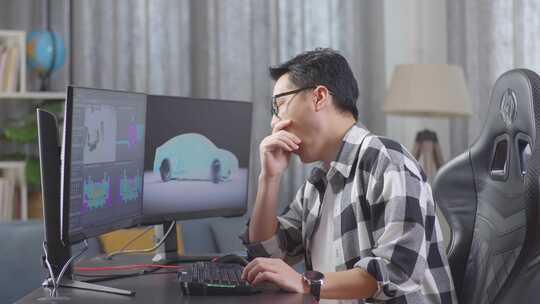 亚洲男性汽车设计师在台式电脑上制作电动汽车3D模型时打哈欠