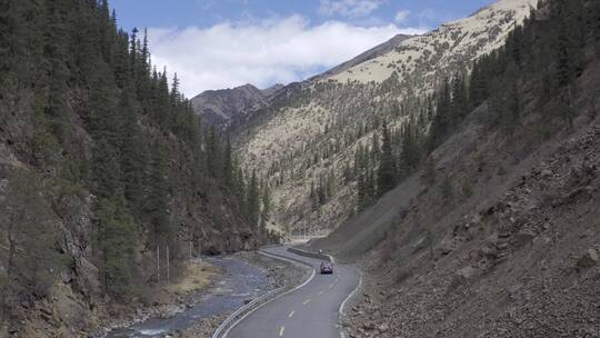 西藏森林河流雪山汽车4k高清航拍广告素材视频素材模板下载