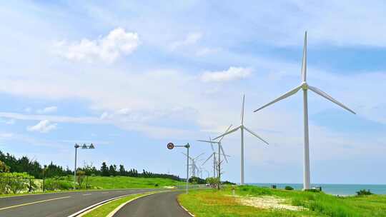 航拍海南文昌环岛旅游自驾旅行与新能源风车