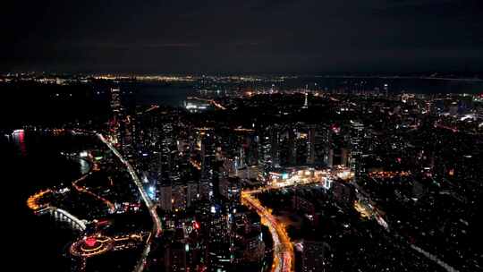 中国山东青岛城市夜景灯光秀航拍鸟瞰