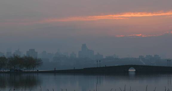 杭州城市西湖白堤清晨日出空镜