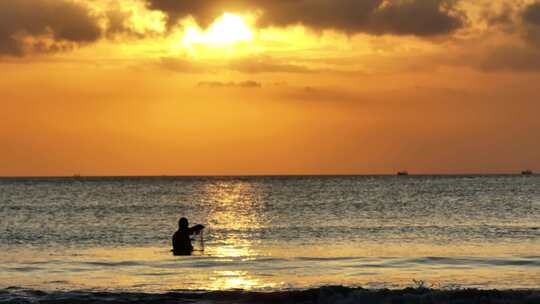大海夕阳日落捕鱼海浪海岛浪漫东南亚巴厘岛