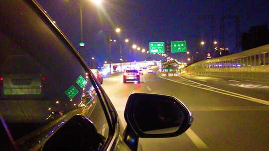 城市夜晚汽车在马路行驶夜景视频素材