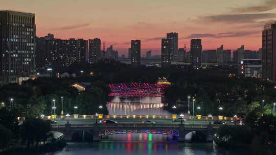 航拍上海五龙湖公园桥梁车流交通