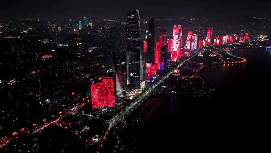 中国山东青岛城市夜景灯光秀航拍鸟瞰