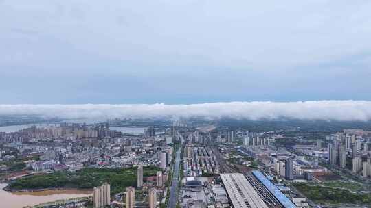 江西省九江市春季雨后烟云与城市景观航拍