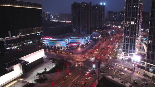 新春佳节夜景商业街高铁站航拍