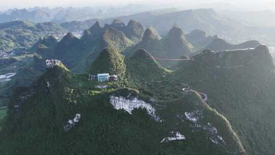 航拍绿意盎然的阳朔如意峰景区风光景色