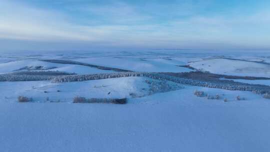 航拍冬季大兴安岭丘陵山地雪野风光