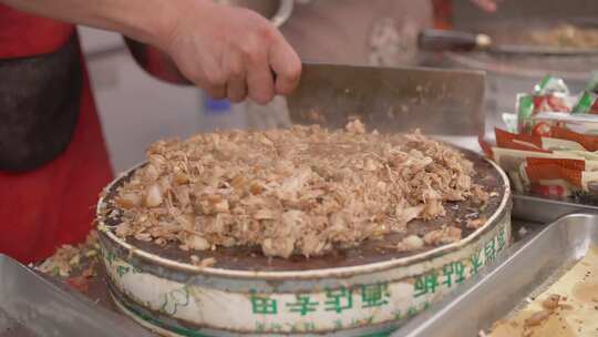 山西运城东湖早市美食稷山半圆饼夹饼子