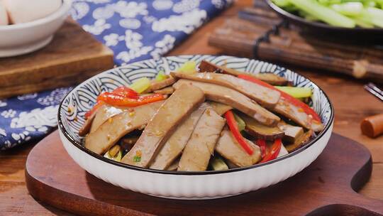 芹菜炒鸡蛋干视频素材模板下载