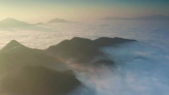 航拍高山群山山峰之间云雾云海