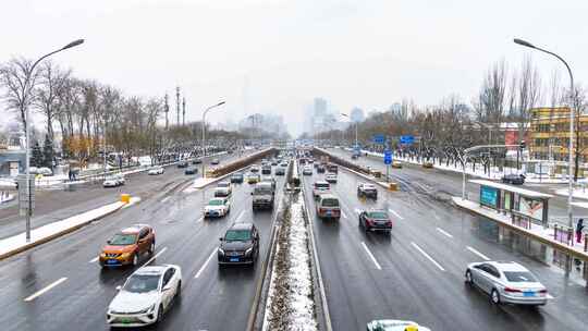 北京冬季白天下雪天三环路车流延时视频素材模板下载