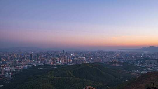 昆明市高视角城市风光日转夜延时摄影