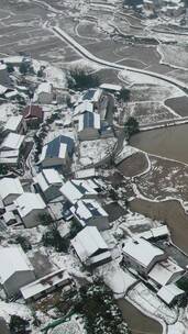 美丽乡村冬天雪景竖屏航拍