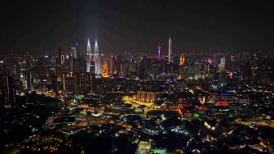 马来西亚吉隆坡莫迪卡石油双子塔夜景航拍