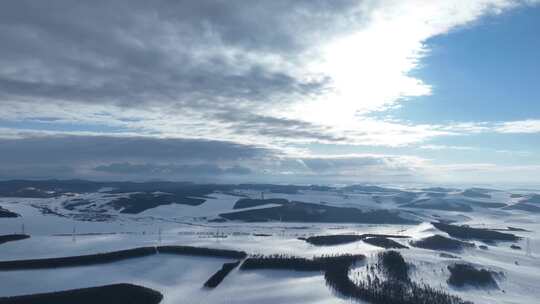 延时航拍寒冬丘陵雪原风光