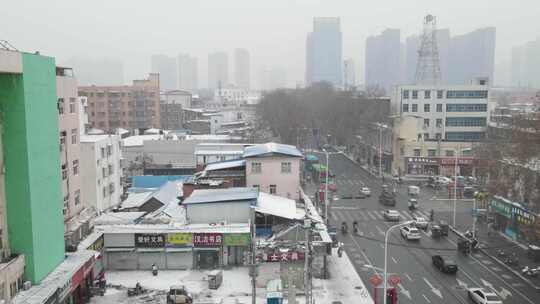 河南南阳城市冬季雪景航拍起飞