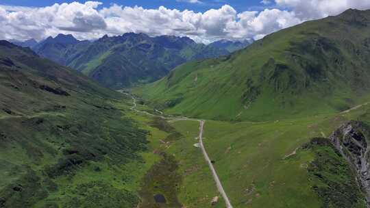 航拍四川独库公路宝康线盘山路草原森林风光