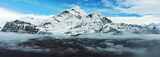 延时宽屏蓝天白云云雾缭绕的雪山风光6K素材高清在线视频素材下载