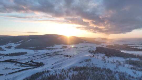 极寒丘陵雪原灿烂夕阳