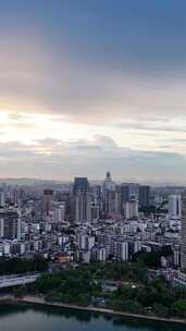 竖屏航拍广西柳州城市晚霞夜幕降临