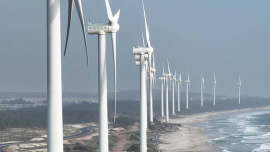 航拍海边风力发电风车