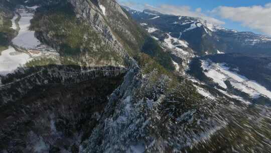 FPV穿越机无人机航拍雪山森林山脉峡谷白云