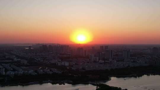 城市夕阳晚霞日落航拍东营日落