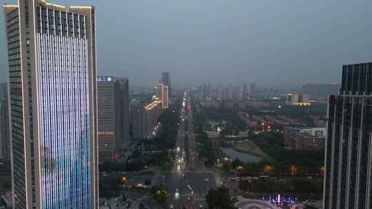 河南新乡市城市夜幕降临夜景灯光航拍视频素材模板下载