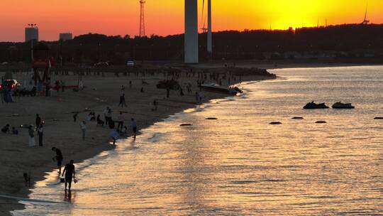 航拍风车海滩夕阳