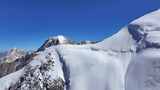 航拍川西横断山脉勒多曼因雪山山脊冰川风光高清在线视频素材下载