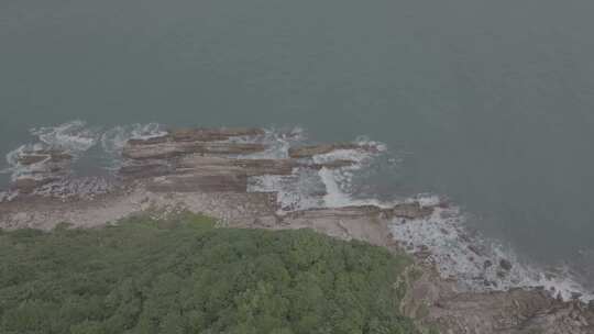 深圳大鹏城杨梅坑海岸礁石航拍视频素材模板下载