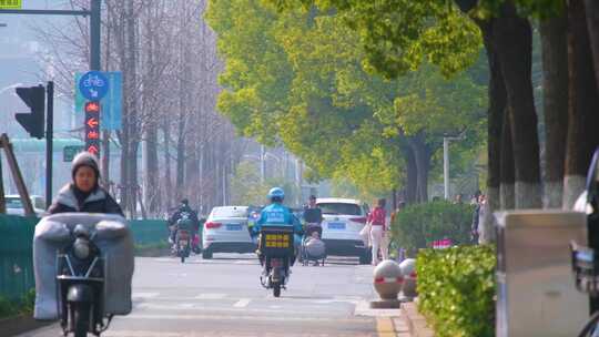 城市马路上班下班高峰期车流人流城市景观人