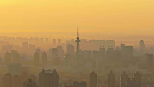 中国黑龙江哈尔滨日出晨雾城市风光航拍
