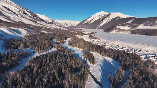 新疆阿勒泰禾木日出远景雪山航拍壮观风景