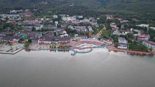 西昌邛海湿地公园月亮女神黄昏夜景航拍实时视频素材模板下载