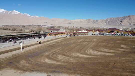 航拍新疆南疆塔县春节人文叼羊比赛视频素材模板下载