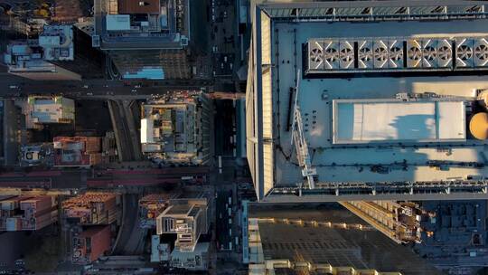 城市航拍俯拍摩天大楼下车流行驶